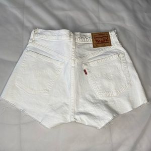 Used (in GREAT condition!) White Levi’s 501 shorts.